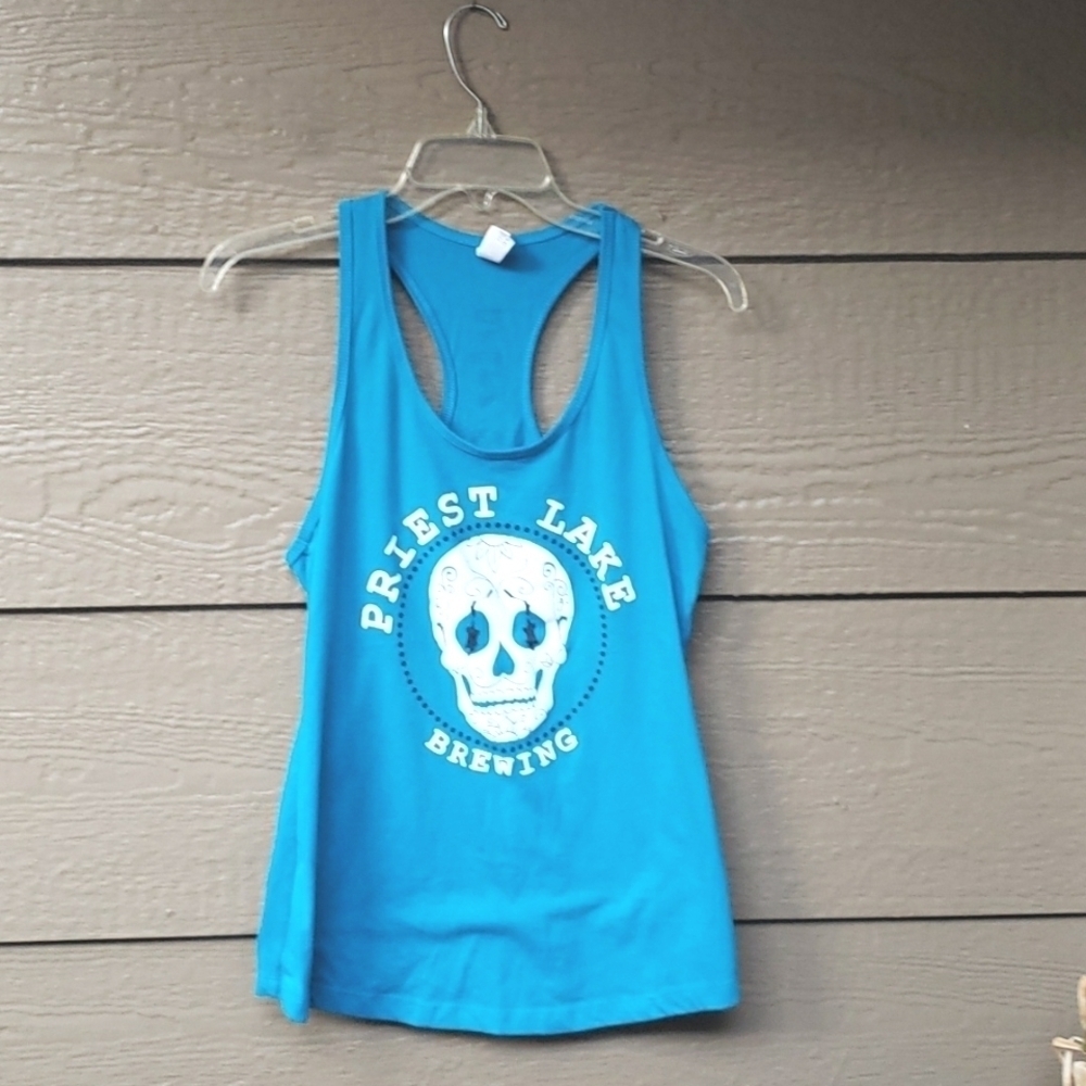 Priest Lake Brewing tank sugar skull turquoise blue and white